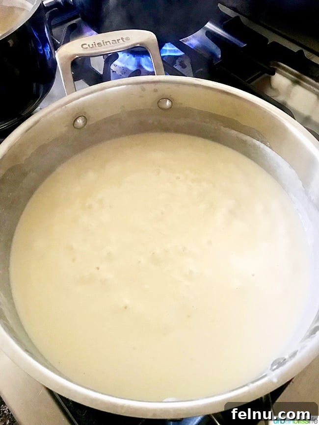 Velvet-Smooth Vegan Fettuccine Alfredo 5 Ingredients for vegan alfredo sauce including coconut milk, nutritional yeast, and garlic
