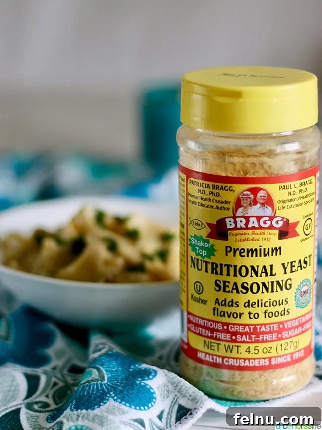 Velvet-Smooth Vegan Fettuccine Alfredo 6 A bowl of nutritional yeast flakes, key for dairy-free cheesy flavor