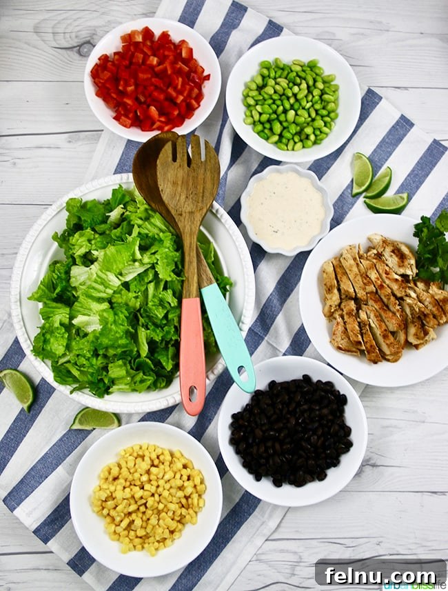 Creamy Southwest Dairy Free Ranch Chicken Salad 4 sliced chicken and assorted vegetables in bowls