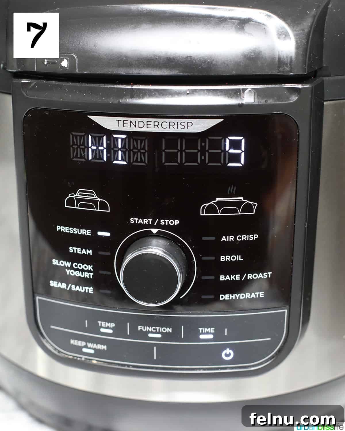 Ultimate Instant Pot Chicken Adobo 12 Ninja Foodi pressure cooker set to Pressure Cook on HI for 9 minutes.