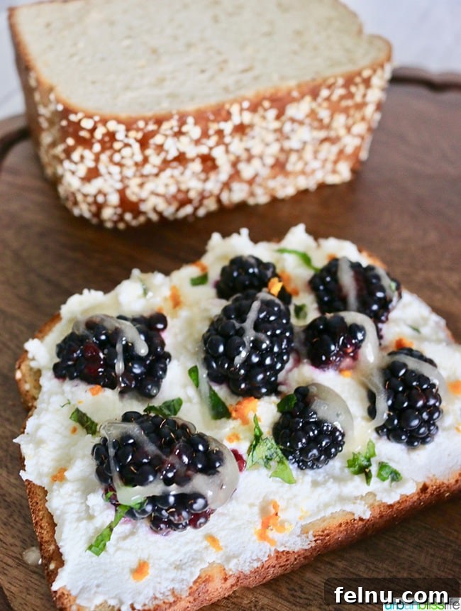 Ricotta Toast with Blackberry Citrus Zest 6 Slices of Blackberry Ricotta Toast on a Wooden Board