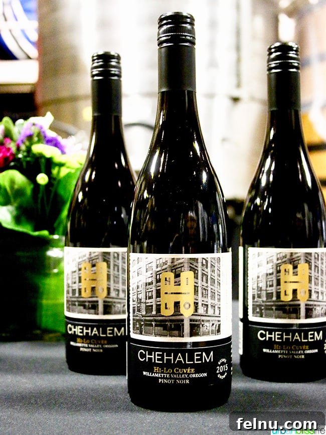 Chehalem Winery and Hi-Lo Hotel Present Hi-Lo Cuvée Wines 3 Three bottles of Hi-Lo Cuvée wine, including Pinot Noir, displayed in a hotel setting
