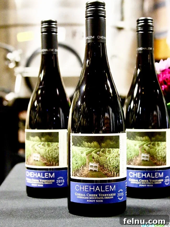 Chehalem Winery and Hi-Lo Hotel Present Hi-Lo Cuvée Wines 8 Several bottles of Chehalem Winery's red wine, likely Pinot Noir, lined up