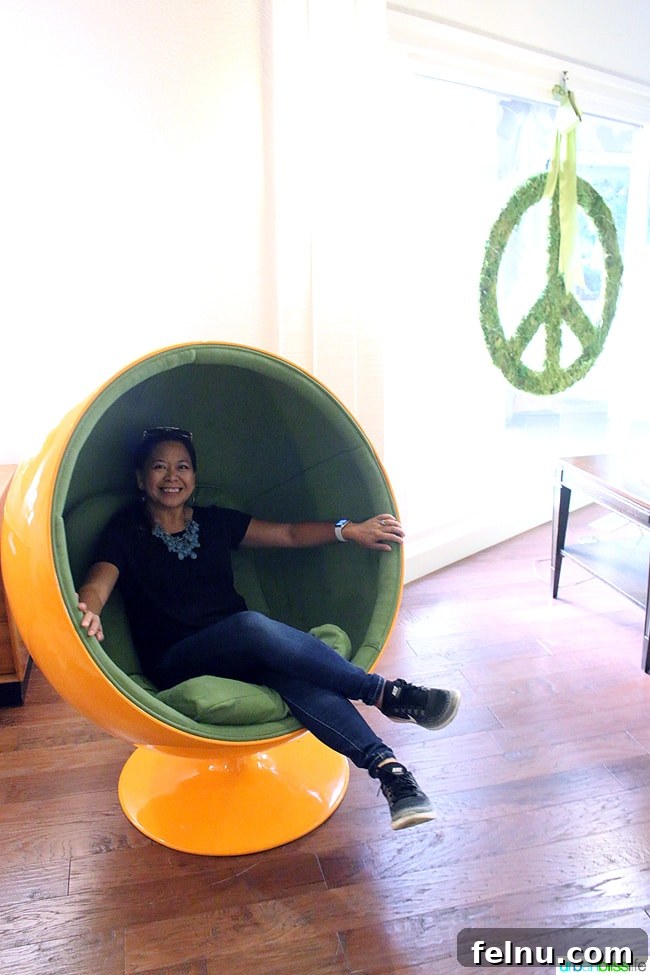 Things to Do and See in Ashland: A Local's Guide 14 Stylish orange swivel chair in a room at Ashland Hills Hotel and Suites