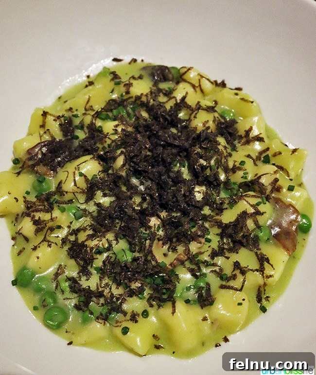 Where Caribbean Spice Meets Creole Soul at Compère Lapin New Orleans 9 Potato gnocchi with English peas and shiitake mushrooms topped with freshly shaved truffles at Compère Lapin.