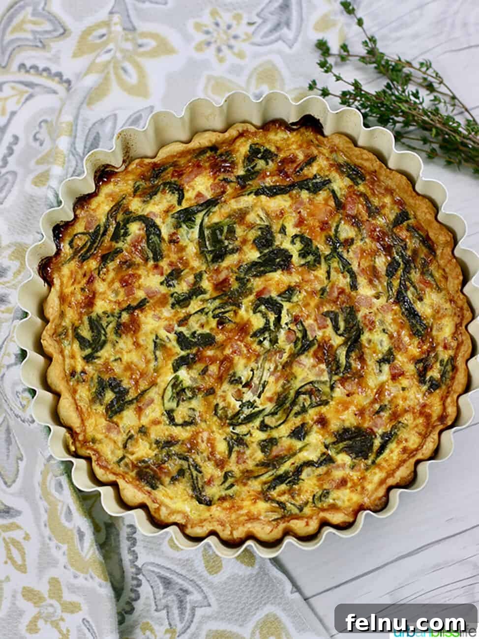 Farmhouse Ham and Spinach Quiche 7 Ham and Spinach Quiche in a pie tin overhead