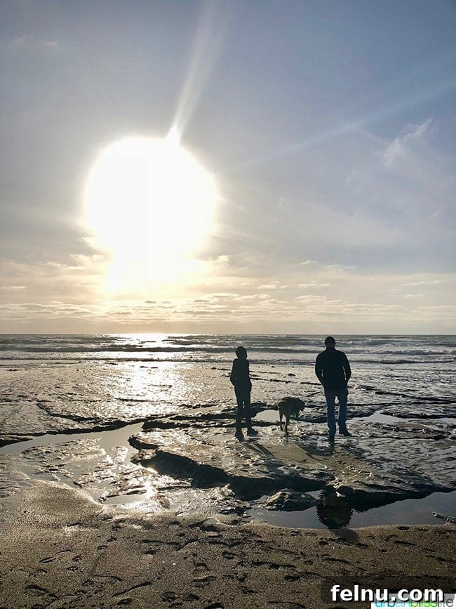 Family enjoying a sunset on Lincoln City Oregon Beach