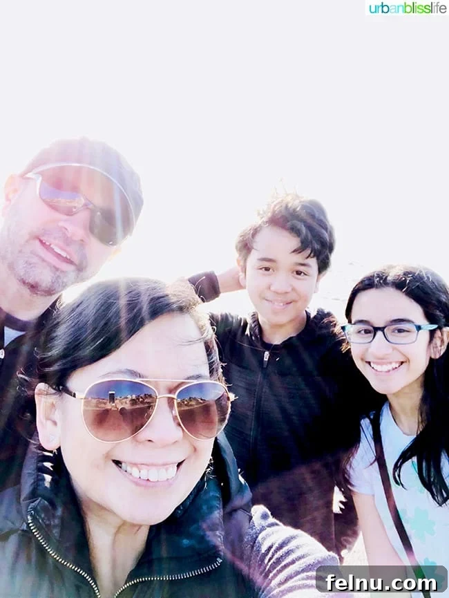 Family portrait on Lincoln City, Oregon beach.