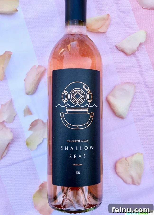 Rose Renaissance: Must-Try Wines for Every Palate 6 Shallow Seas Rosé wine bottle, showcasing its unique label and vibrant color.