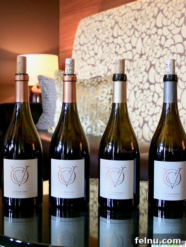 Open Claim Vineyards Unveils Inaugural Vintage and Tasting Room Vision 2 A curated selection of Open Claim Vineyards wine bottles, showcasing their elegant labels and the rich colors of the wine within.