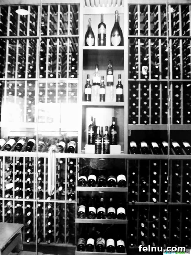 Preserve Your Pour: A Homeowner's Guide to Wine Storage Excellence 3 wine bottles in storage rack