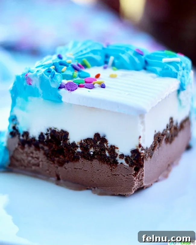 Effortless DIY Unicorn Hard Shell Topping 5 Slice of ice cream cake with unicorn magic shell