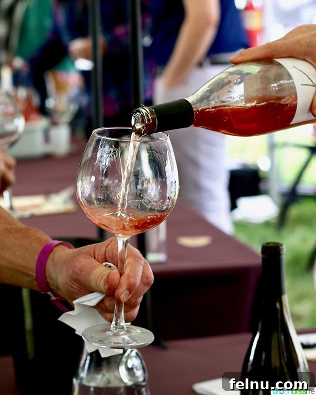 Uncork Anderson Valley: The Best Wineries to Explore 21 Rosé wine being poured into a glass at the festival