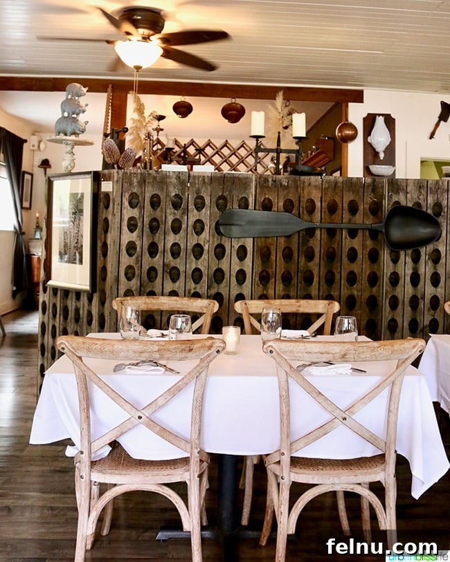 The Puzzled Piglet 7 A single table setting inside The Bewildered Pig, highlighting the restaurant's attention to detail