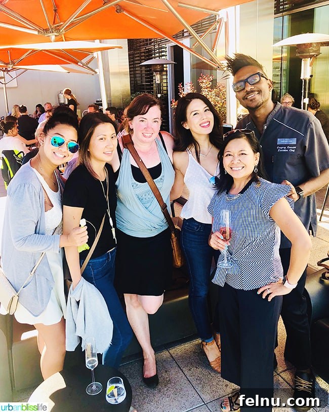 Cool Summer Dairy-Free Ice Cream at Departure Portland 14 A group of smiling food bloggers and Chef Gregory Gourdet posing together at Departure restaurant, celebrating their summer ice cream creations.