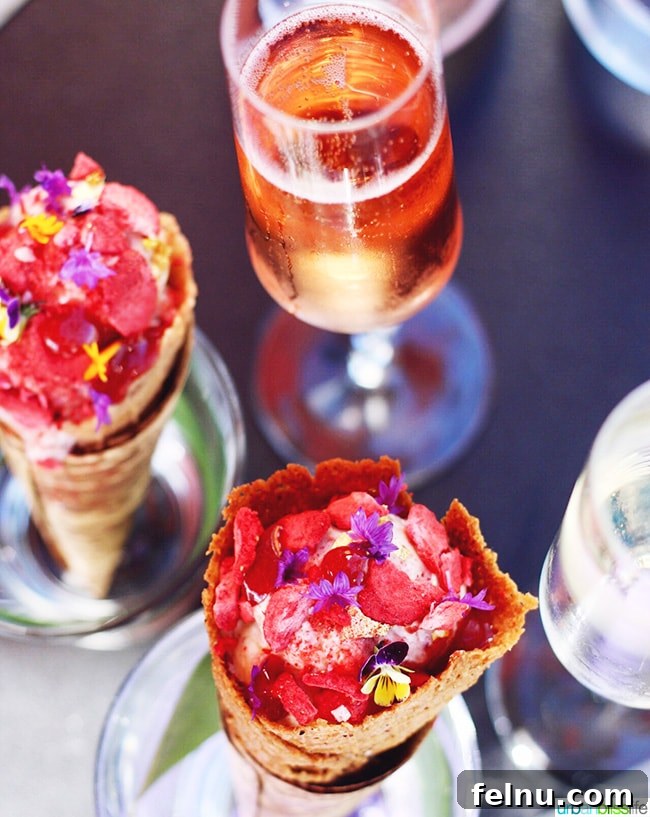 Cool Summer Dairy-Free Ice Cream at Departure Portland 5 Exquisite dairy-free coconut ice cream with a delicate rose petal garnish, infused with a fermented berry swirl, and topped with gold leaf.