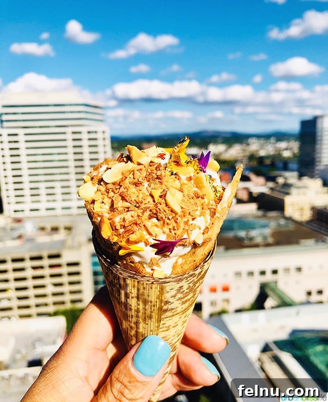 Cool Summer Dairy-Free Ice Cream at Departure Portland 6 A creamy, peanut milk-based ice cream cone, possibly featuring exotic Thai-inspired flavors like lemongrass and chili.