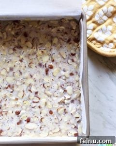 Almond Swedish Visiting Cake Bars 12 Swedish Visiting Cake Bars batter with almond topping, prepared and ready to bake.