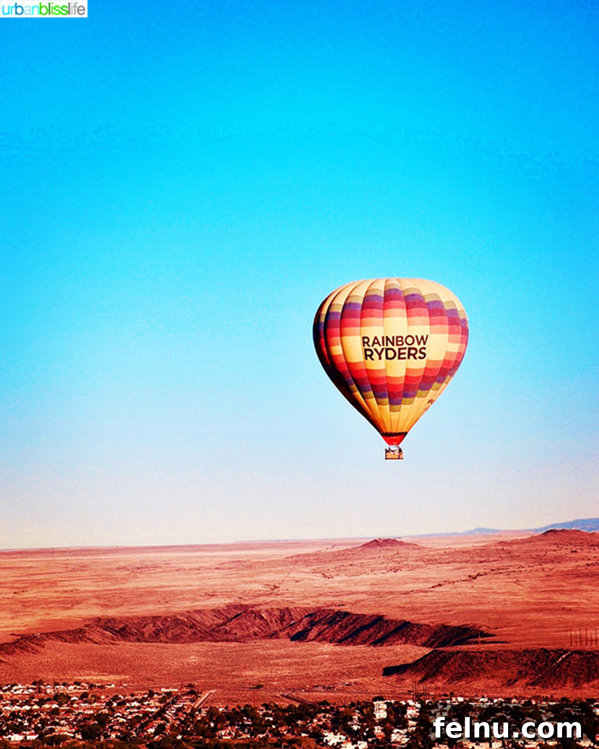 10 Albuquerque Gems You Must Explore 4 Colorful hot air balloons floating over the stunning landscape of Albuquerque at sunrise