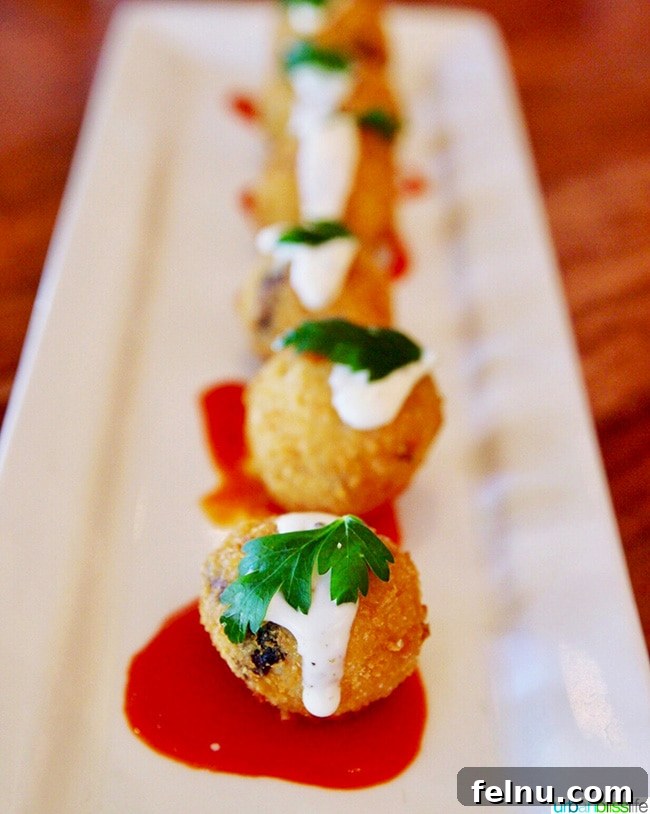 Albuquerque's Best Bites A Local's Food Guide 19 Crispy arancini served at MAS Tapas Y Vino, an appetizer bursting with flavor.