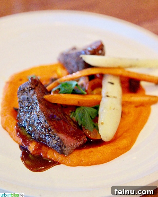 Albuquerque's Best Bites A Local's Food Guide 22 Succulent steak main course at MAS Tapas Y Vino, showcasing culinary excellence.