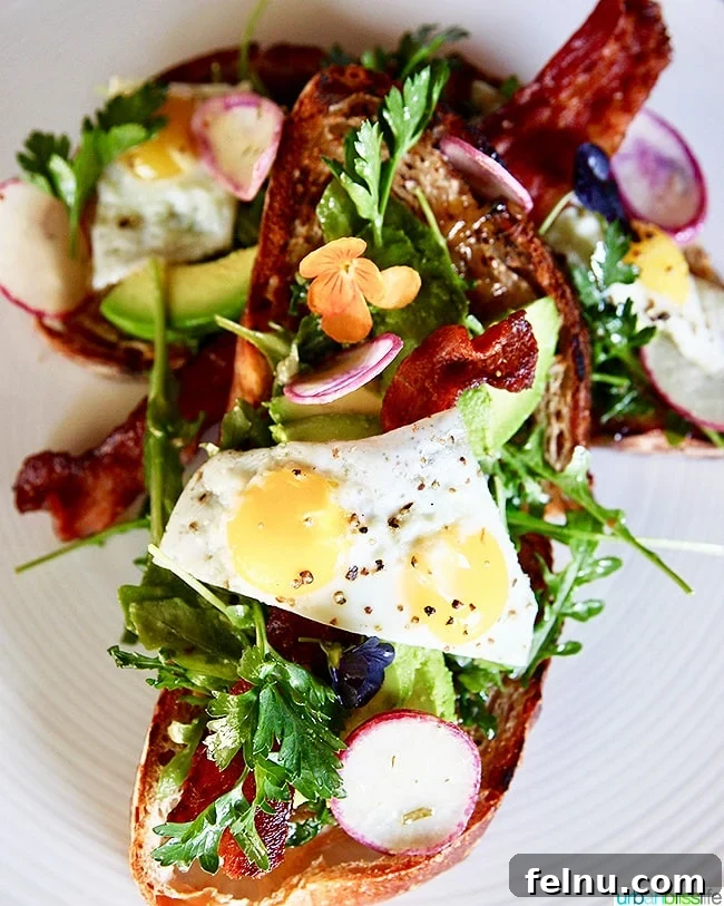 Albuquerque's Best Bites A Local's Food Guide 8 Exquisite avocado toast featuring fresh ingredients and edible flowers at Campo Restaurant.