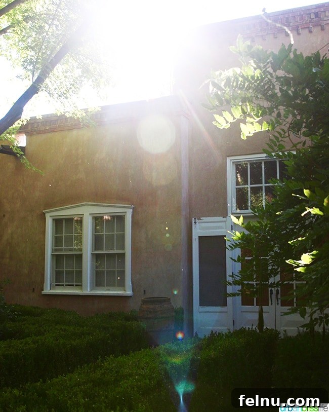 Experience Los Poblanos: Albuquerque's Historic Inn & Organic Farm 14 Building bathed in warm sunlight at Los Poblanos Historic Inn