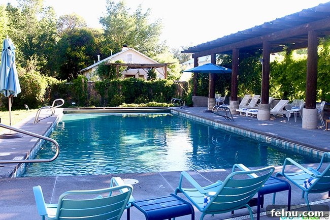 Experience Los Poblanos: Albuquerque's Historic Inn & Organic Farm 16 Serene swimming pool area amidst the Farm Suites at Los Poblanos