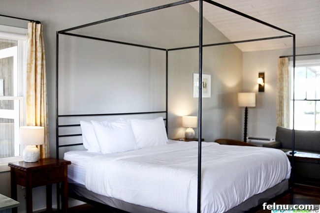 Experience Los Poblanos: Albuquerque's Historic Inn & Organic Farm 19 Comfortable king bed in a guest room at Los Poblanos Inn