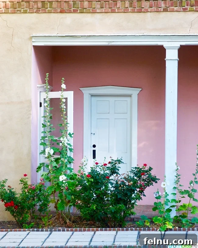 Albuquerque's Hidden Gem: Los Poblanos Historic Inn and Organic Farm 10 charming pink adobe wall and doorway at Los Poblanos Inn Albuquerque New Mexico