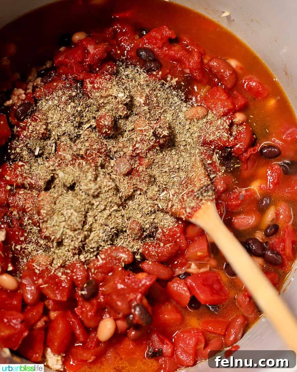Hearty & Healthy Turkey Chili (Instant Pot Friendly!) 15 Adding oregano to the ground turkey chili, infusing it with aromatic flavor.
