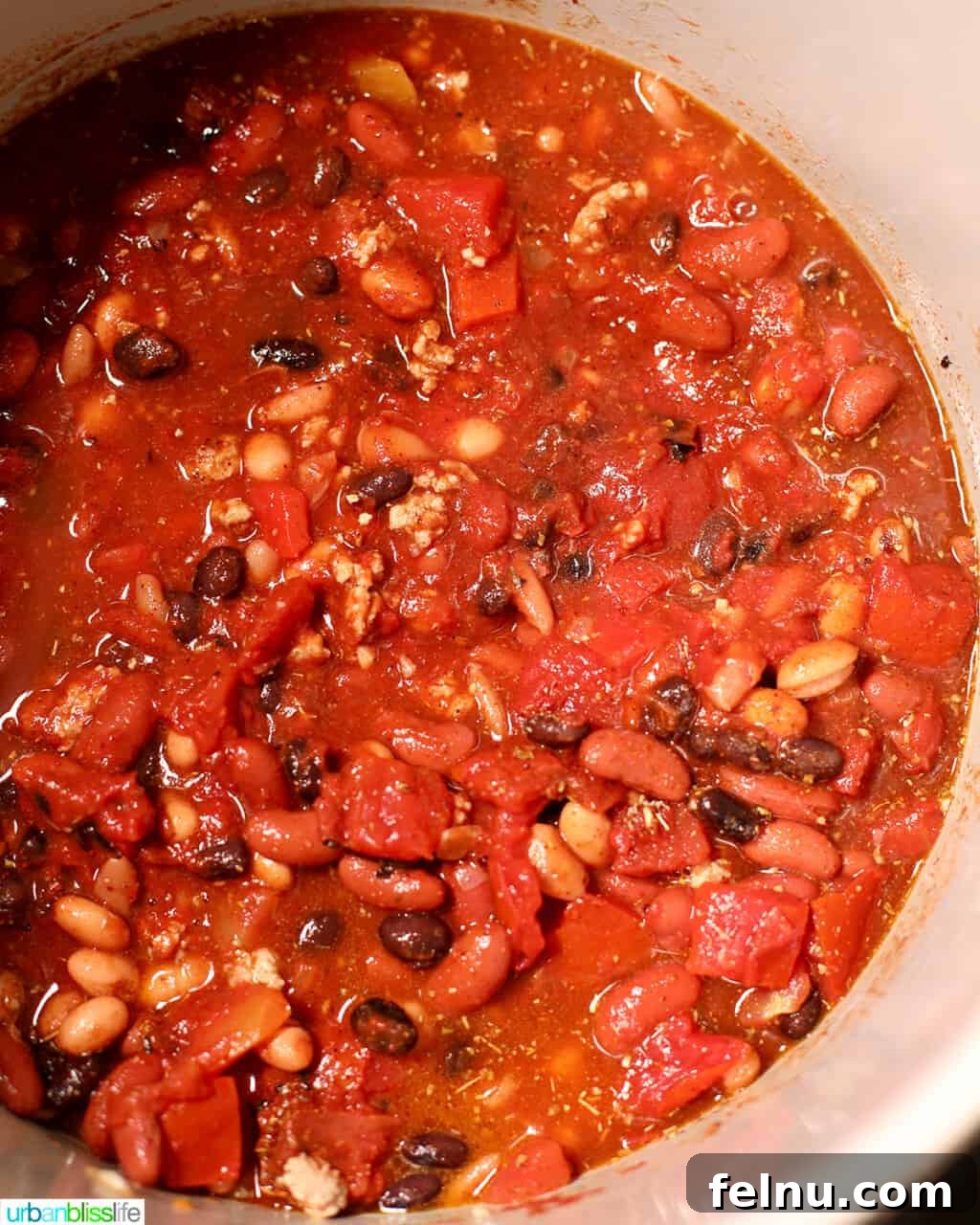 Hearty & Healthy Turkey Chili (Instant Pot Friendly!) 17 Stirred ingredients for chili in the pressure cooker, ready for the next step.