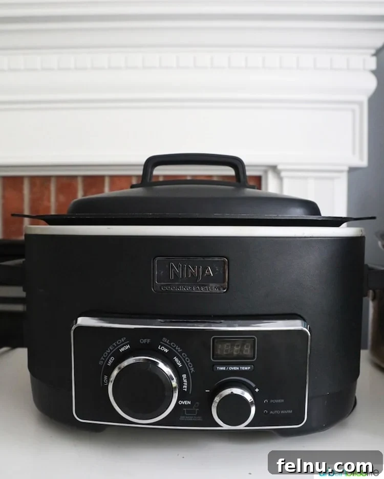 Hearty & Healthy Turkey Chili (Instant Pot Friendly!) 21 A slow cooker in a temporary kitchen setup, illustrating its convenience during kitchen remodeling.