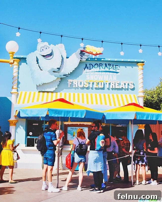 Savor the Flavors of Disneyland Pixar Pier 17 Pixar Pier Adorable Snowman Frosted Treats