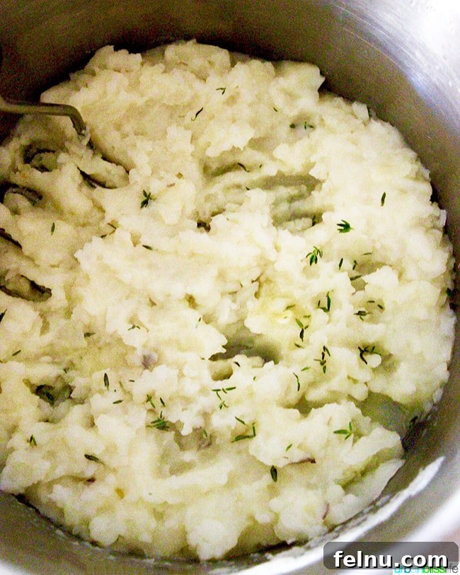 Hearty Dutch Oven Shepherd's Pie 8 Creamy mashed potatoes in a bowl.