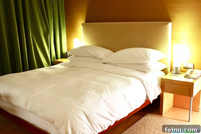 Hilton Athens: Your Guide to a Premium Stay in the Greek Capital 26 Hilton Athens executive Suite Level bed