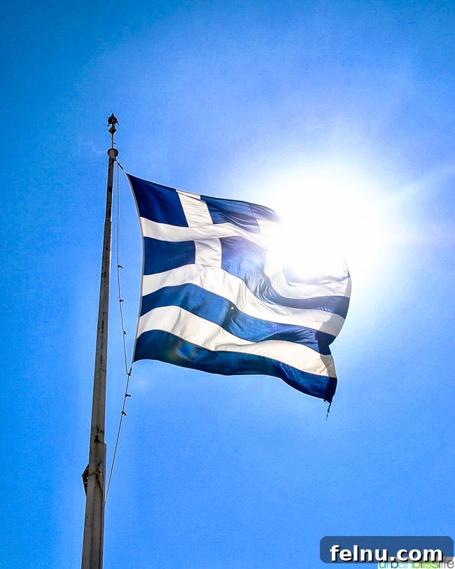 Acropolis Unveiled: Athens Historical Journey 2 Greek flag with sun shining behind it