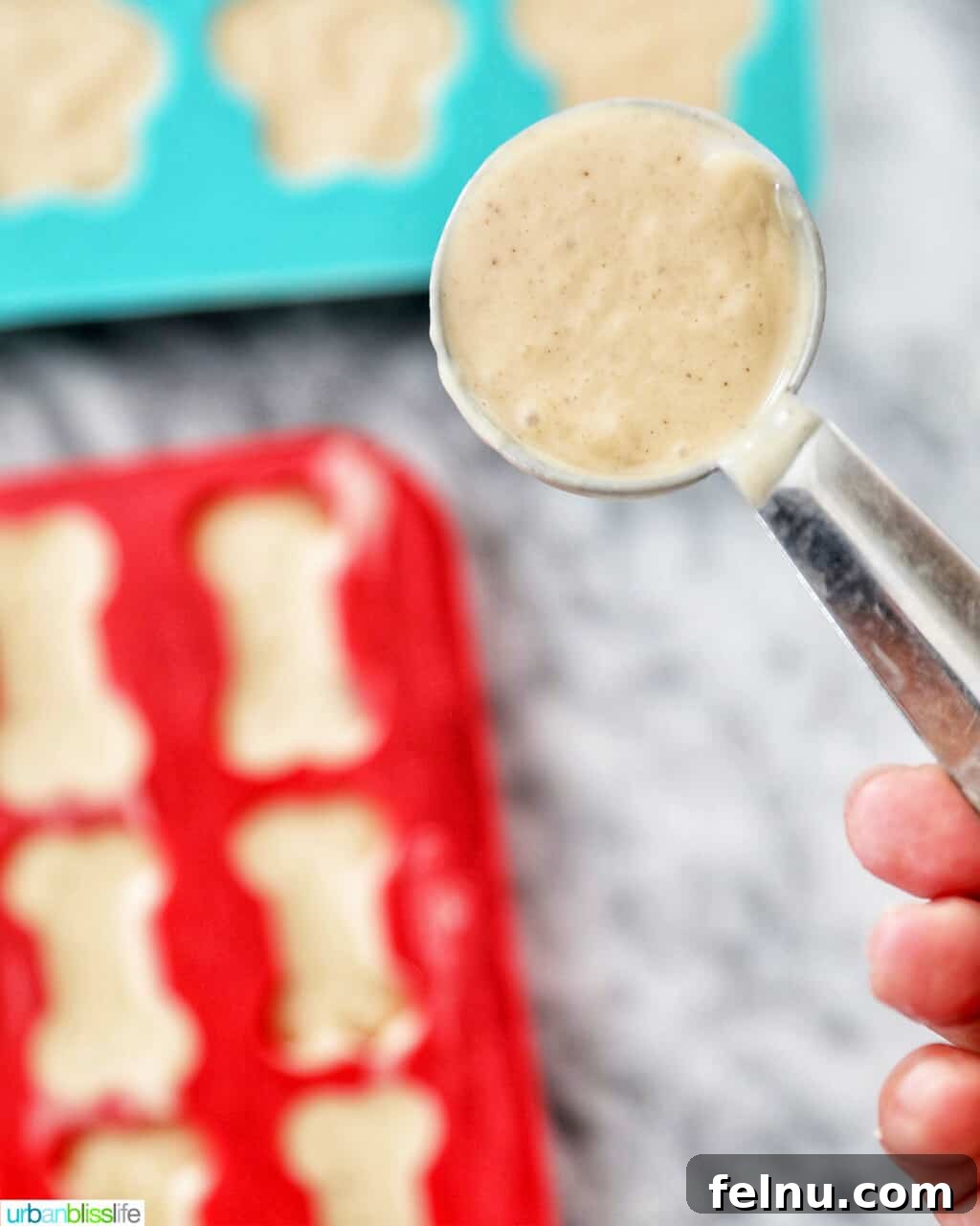 Frozen Banana Peanut Butter Pupsicles 10 scoop of frozen dog treats filling molds