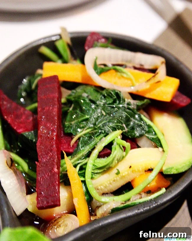 Seasonal beets and fresh vegetables dish at Nolan restaurant in Athens, Greece.