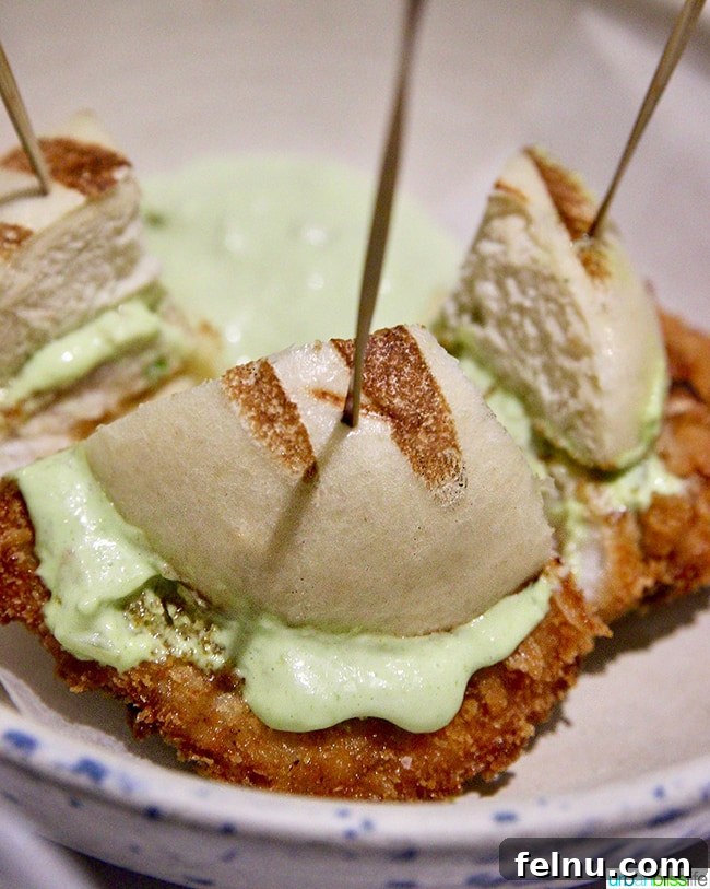 Nolan Cod Burger (NBC), a hearty signature dish at Nolan restaurant in Athens, Greece.
