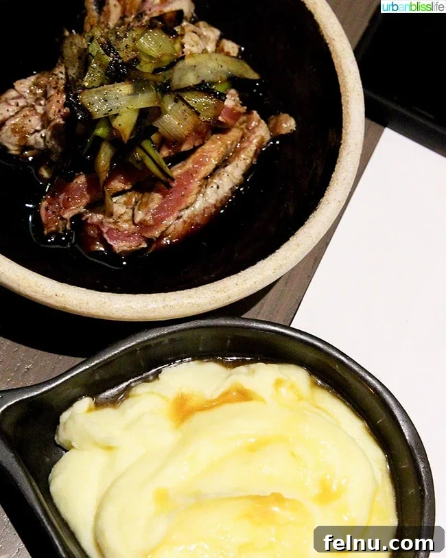 Sirloin with leeks and a side of creamy mashed potatoes at Nolan restaurant in Athens, Greece.