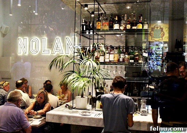 The welcoming exterior of Nolan restaurant in Athens, Greece, inviting diners to a unique culinary experience.