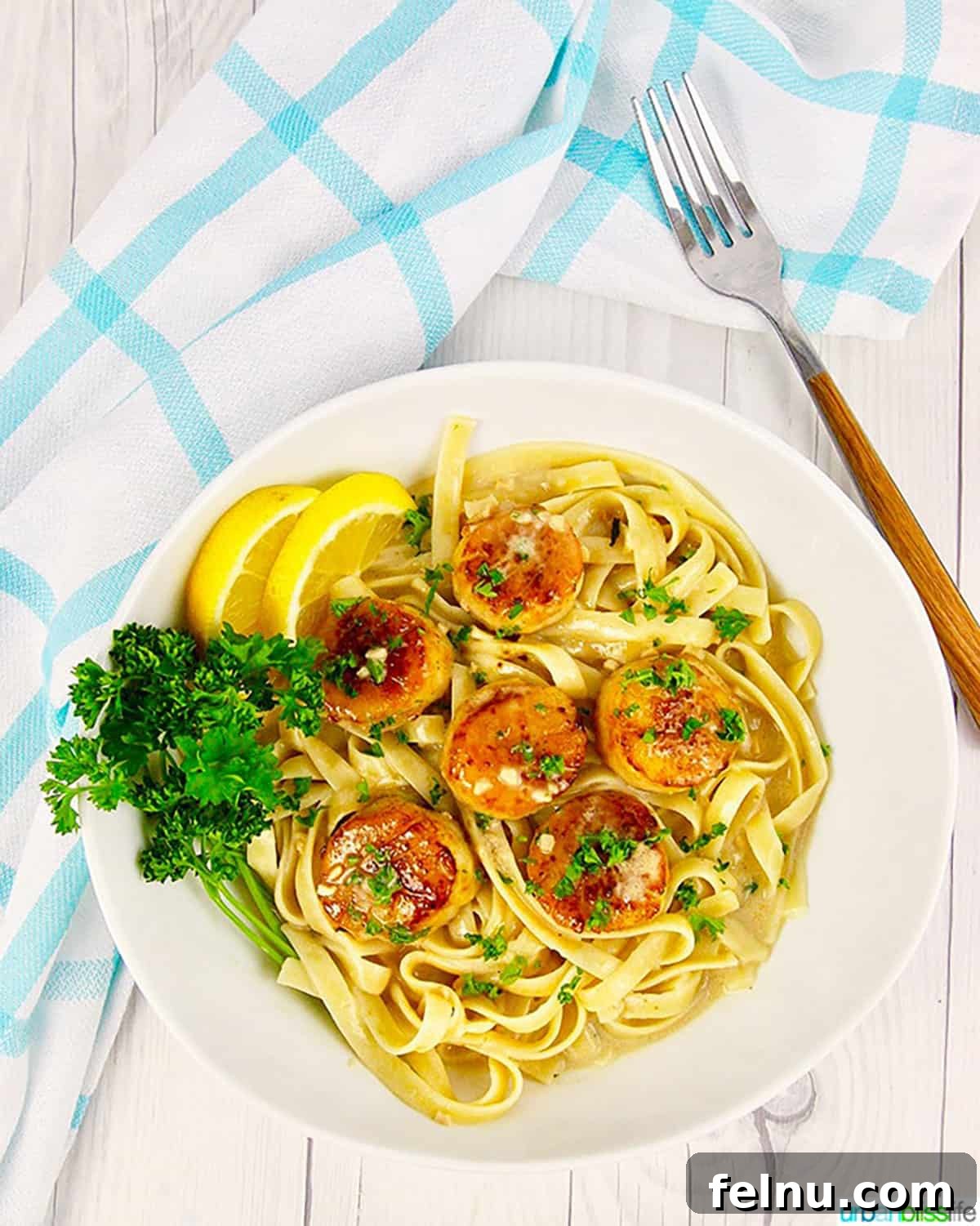 Lemon Garlic Scallop Pasta Dairy-Free Zesty Scallop Pasta: A Dairy-Free Delight 3 Close-up of lemon garlic scallop pasta in a bowl