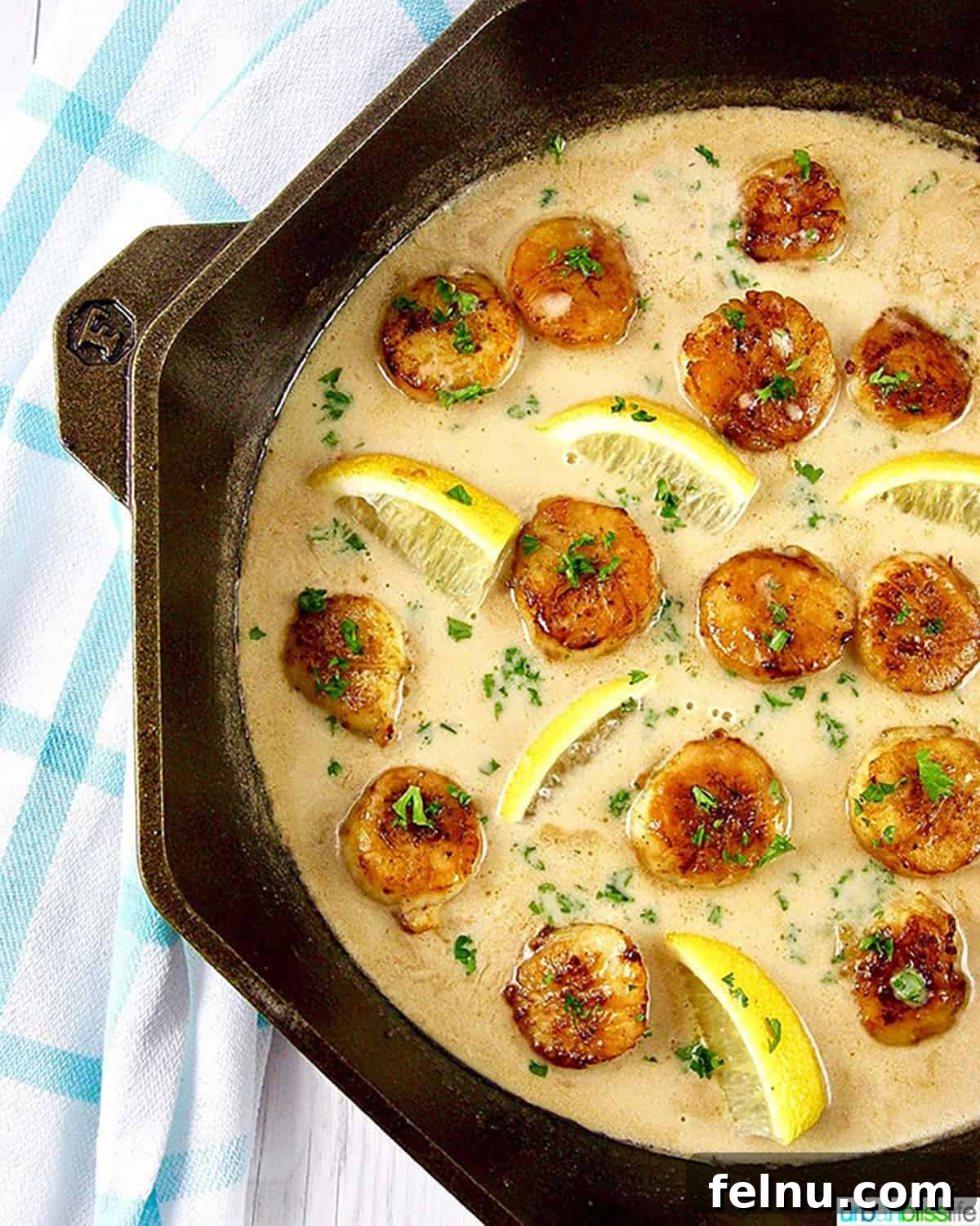 Lemon Garlic Scallop Pasta Dairy-Free Zesty Scallop Pasta: A Dairy-Free Delight 4 Lemon garlic scallop pasta in a cast iron skillet