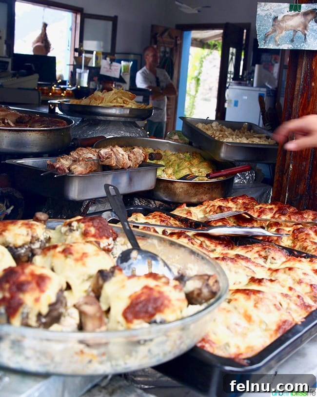 Greece Travel: Discover Olympos Village, Karpathos 16 A food stall in Olympos, Karpathos, offering traditional Greek dishes