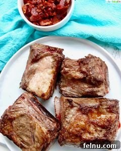 Slow-Cooker Short Rib Ragu: A Rich & Effortless Delight 8 beef short ribs seared with bacon