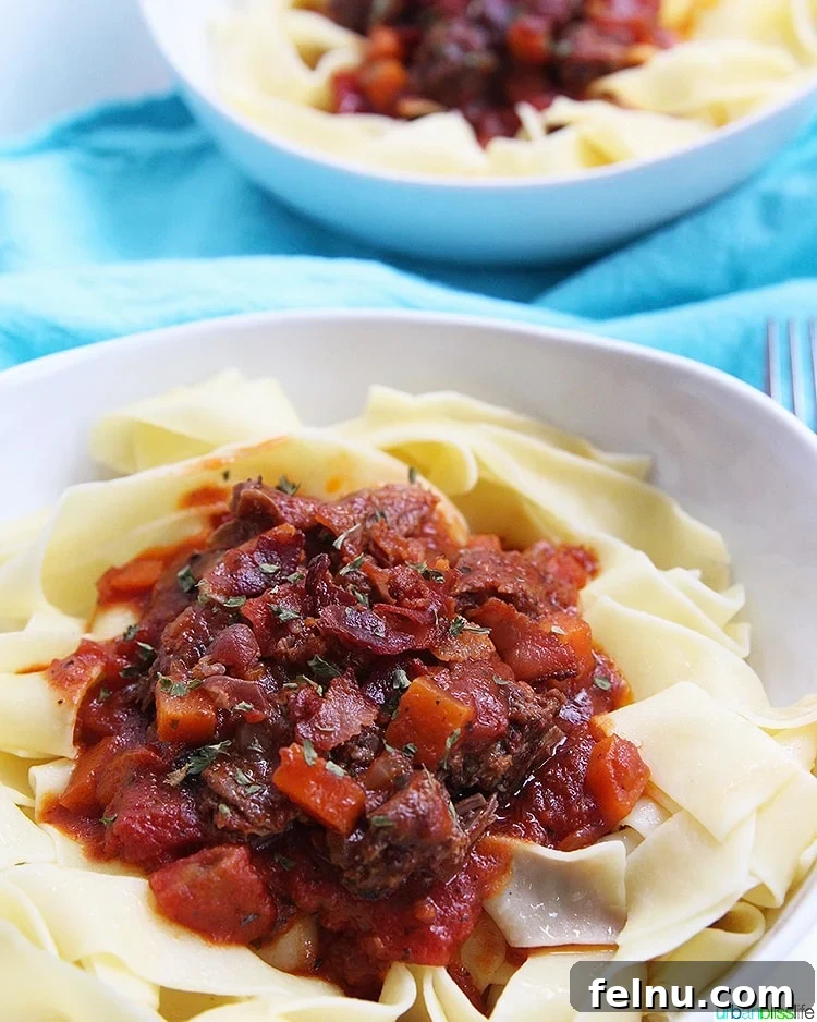 Slow-Cooker Short Rib Ragu: A Rich & Effortless Delight 4 Bowls of Instant Pot Short Ribs Ragu over pasta