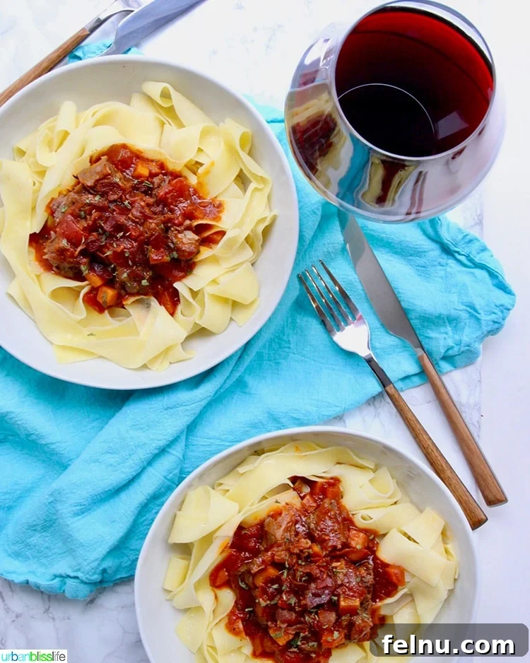 Slow-Cooker Short Rib Ragu: A Rich & Effortless Delight 6 Instant Pot Short Rib Ragu served with red wine