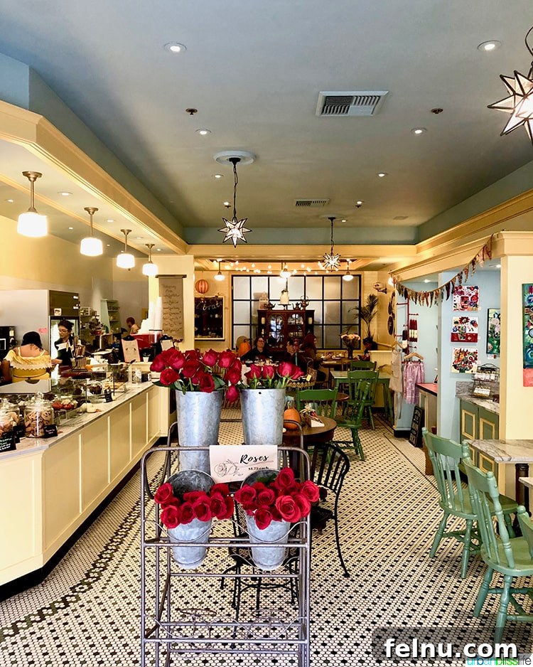 Surf, Sips, and City: San Jose to Livermore California Weekend 13 The inviting and cozy interior of Buttercup Bakery, featuring warm lighting and charming decor.