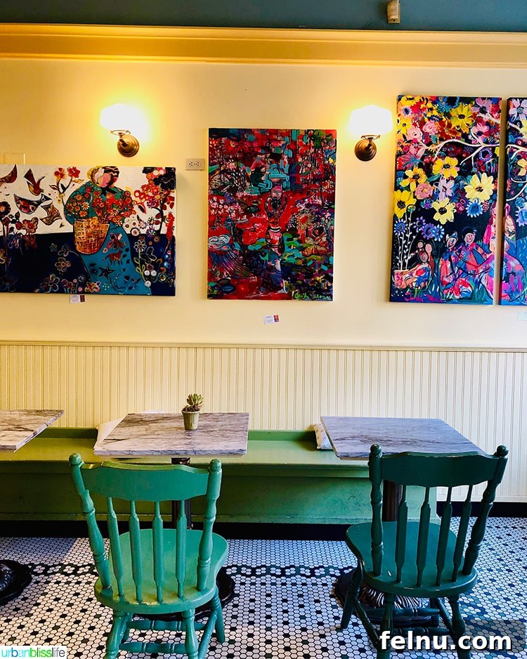 Surf, Sips, and City: San Jose to Livermore California Weekend 14 Artistic paintings and comfortable seating arrangements inside Buttercup Bakery, creating a relaxed ambiance.